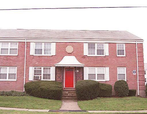 45 Standish Road, Unit 17G1 Stamford, CT 06902 - Photo 1 of 1 a front view of a house