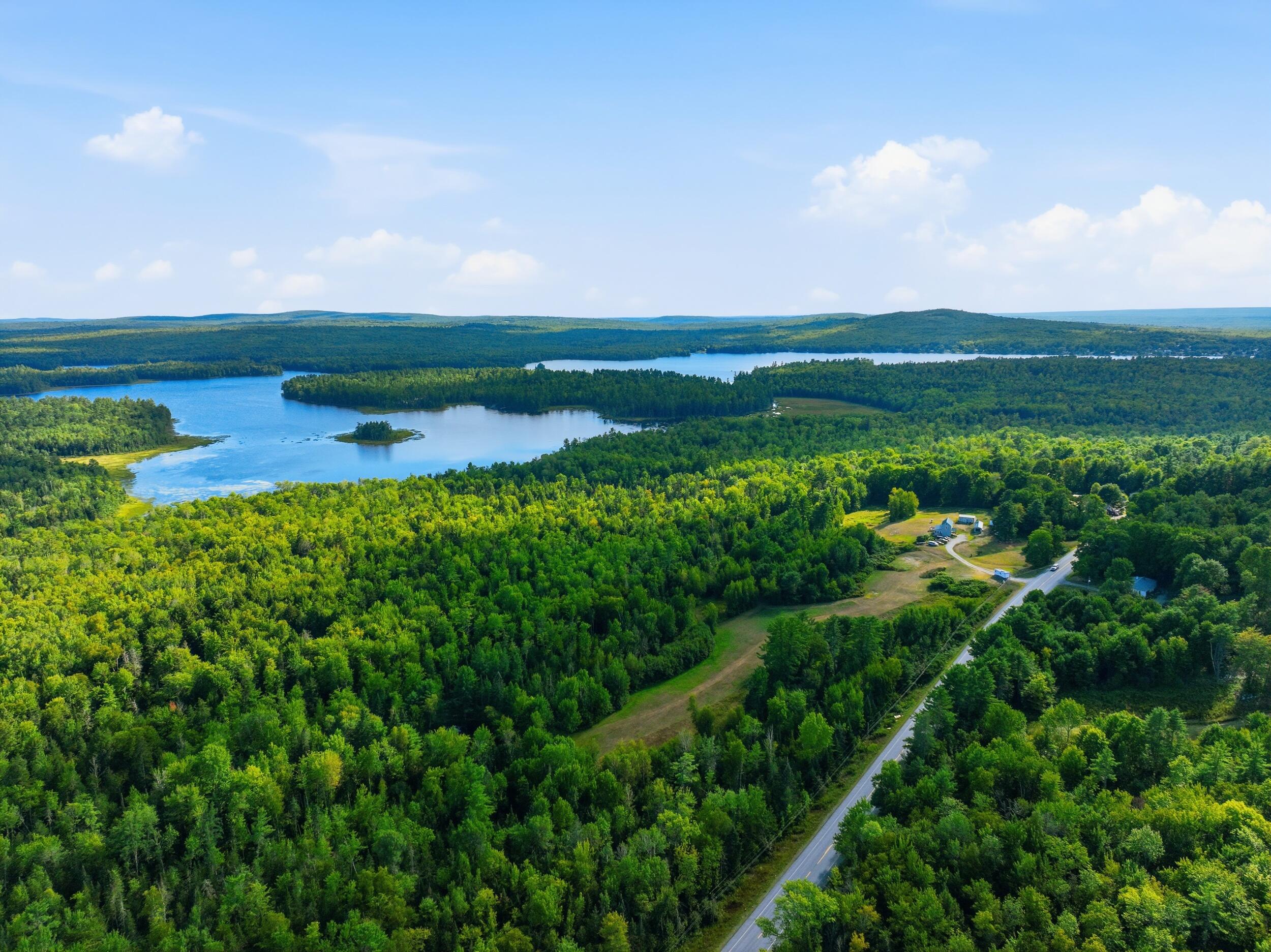395 Lee Road Lincoln, ME 04457 - Photo 60 of 61 066_395lee_aerial_regional_lake_5