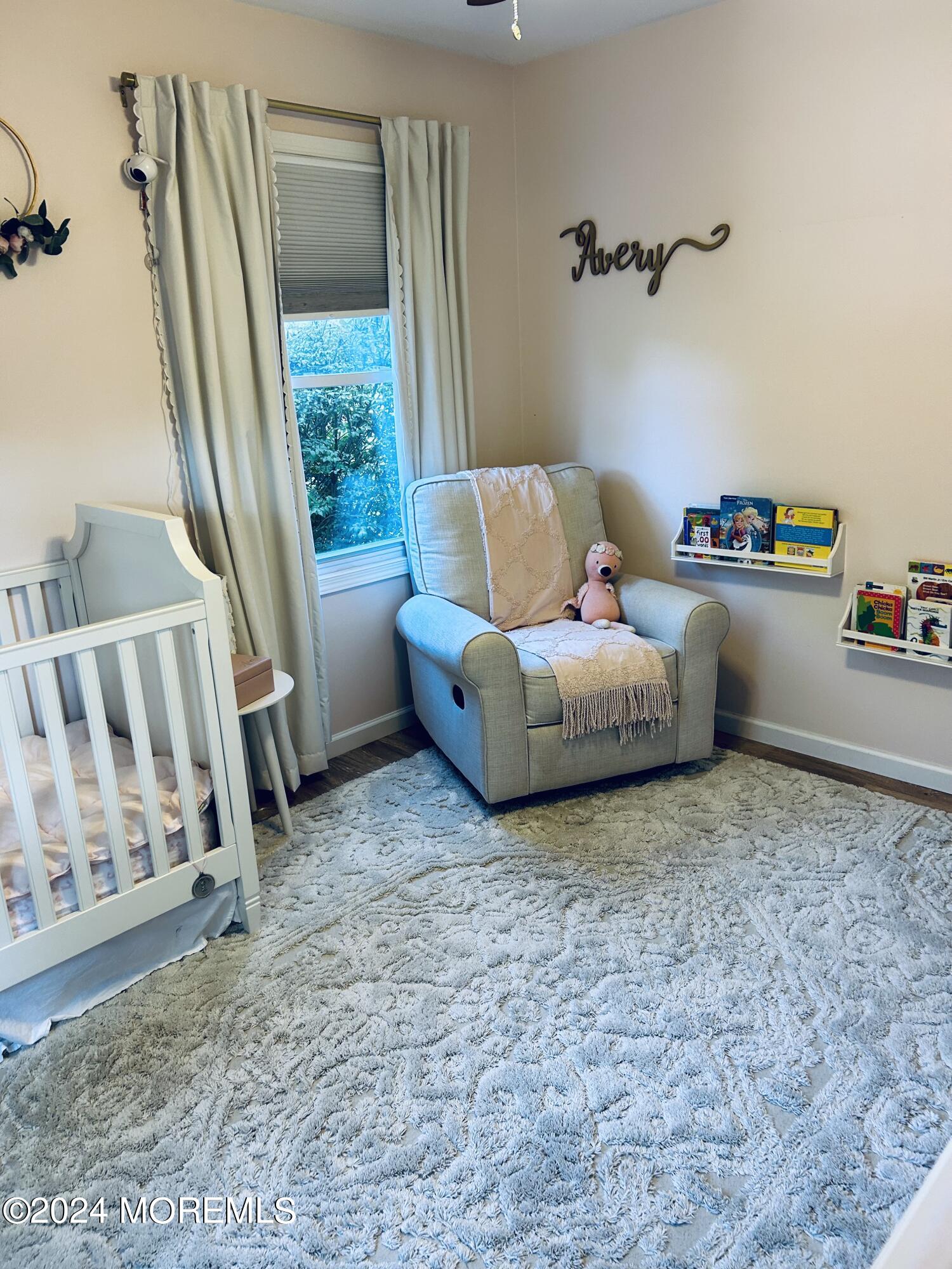 8 Old Farm Road Tinton Falls, NJ 07724 - Photo 12 of 24 a living room with furniture and a large window