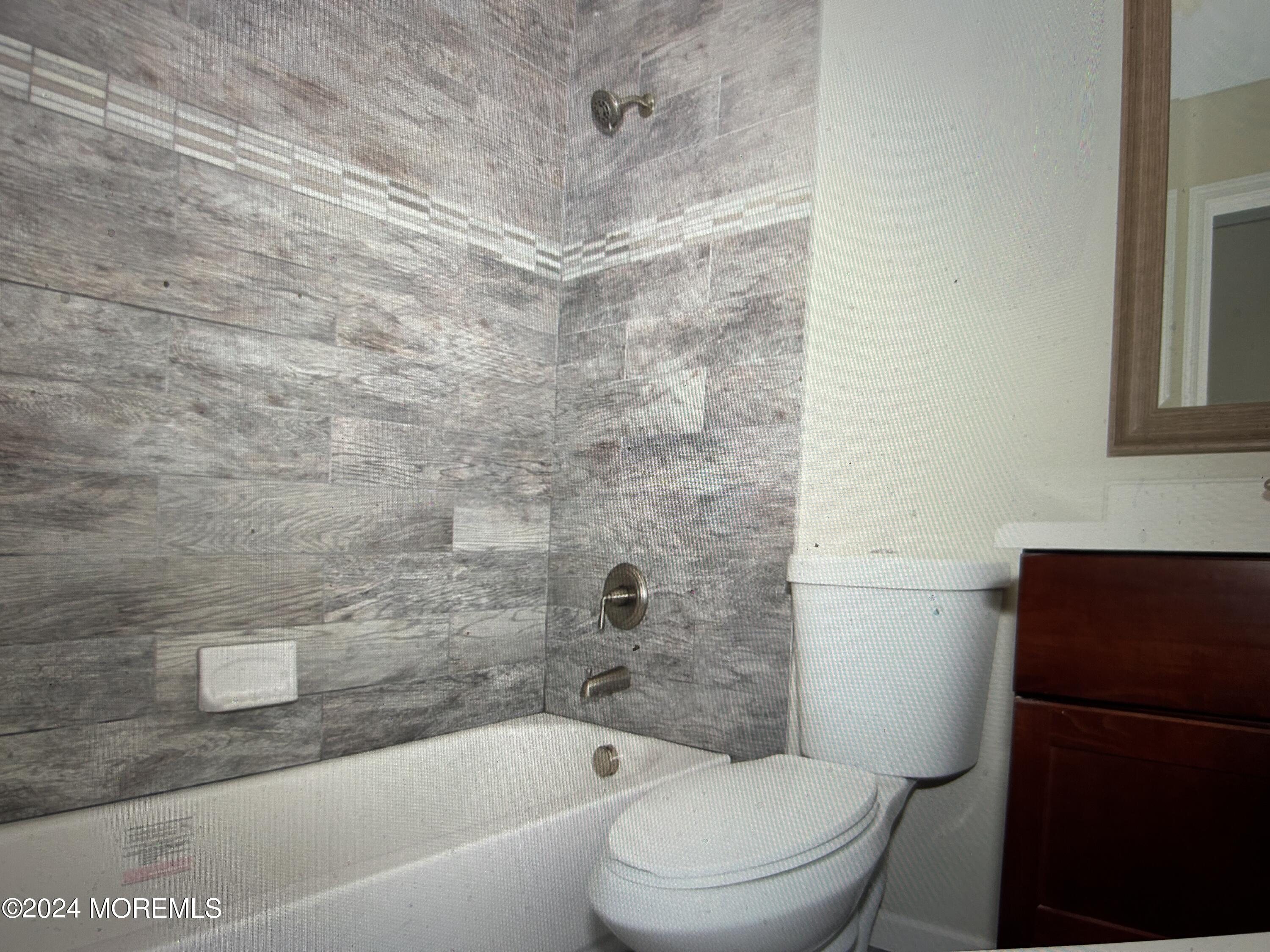 8 Old Farm Road Tinton Falls, NJ 07724 - Photo 14 of 24 a bathroom with a toilet and a shower