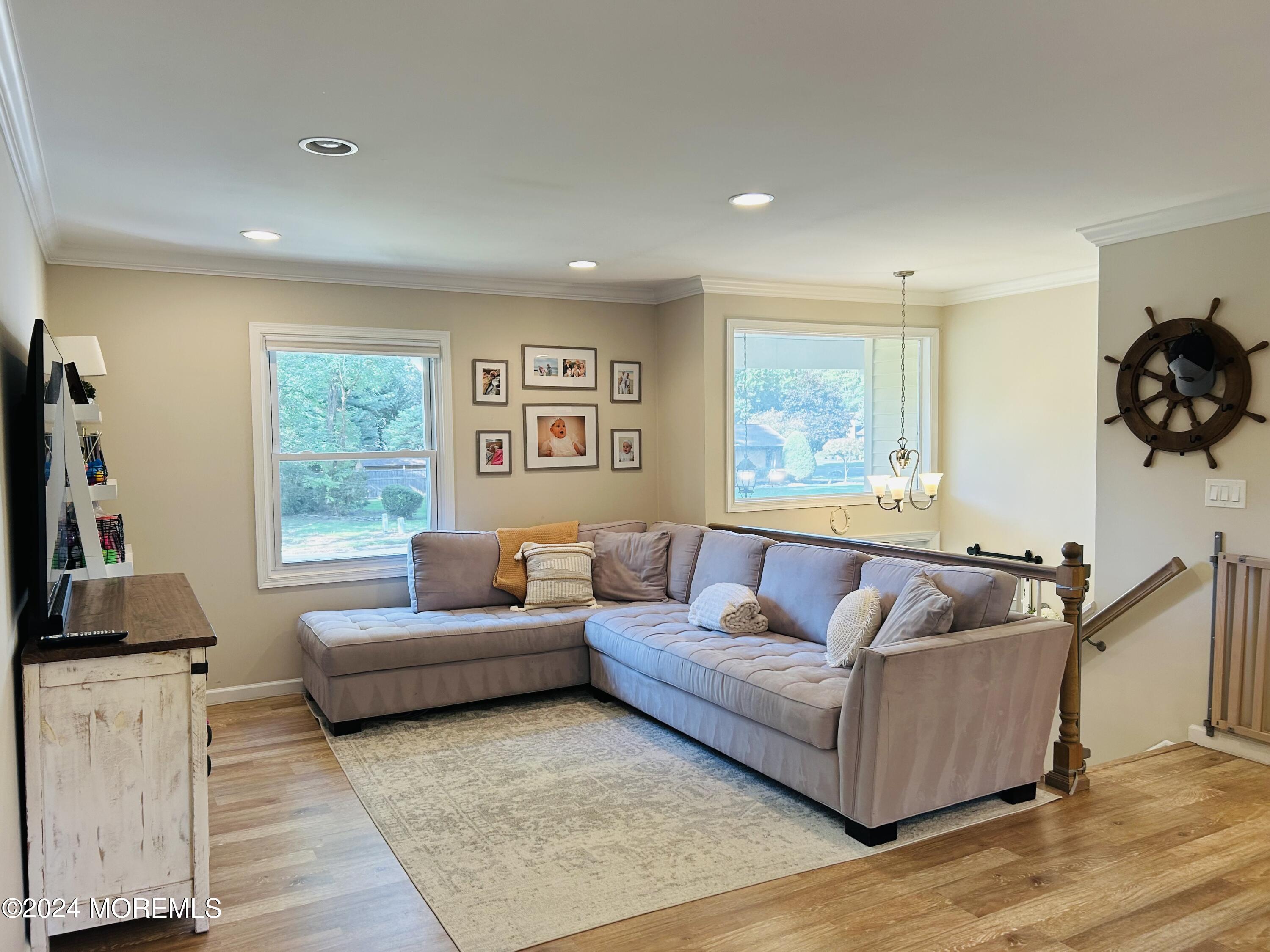 8 Old Farm Road Tinton Falls, NJ 07724 - Photo 9 of 24 a living room with furniture and a window
