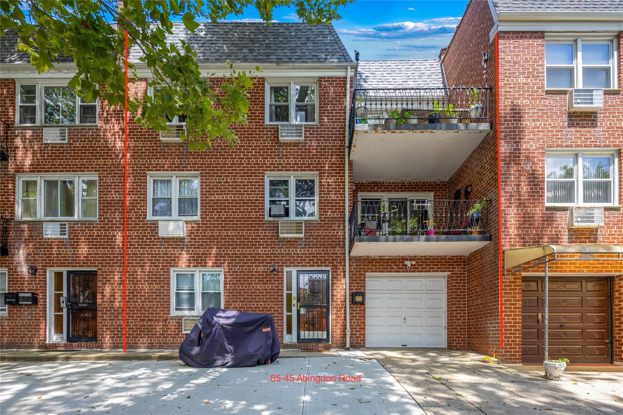 85-45 Abingdon Road Queens, NY 11415 - Photo 2 of 13 a view of a brick building with many windows