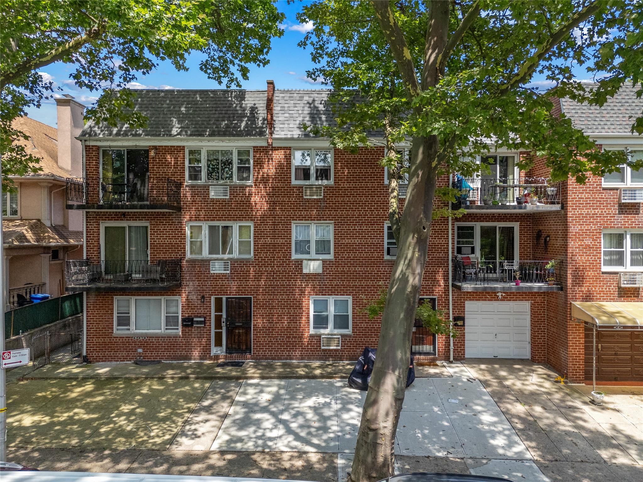 85-45 Abingdon Road Queens, NY 11415 - Photo 4 of 13 a view of a yard in front of house