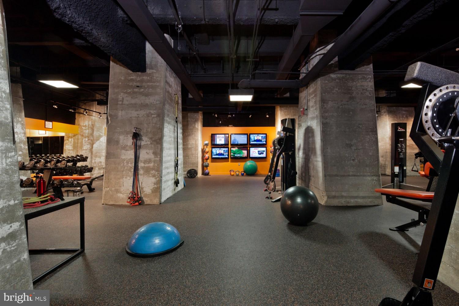 1200 Steuart Street, Unit 713 Baltimore, MD 21230 - Photo 32 of 43 a view of a room with gym equipment