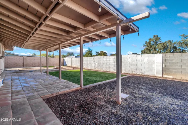 a view of a backyard with a garden
