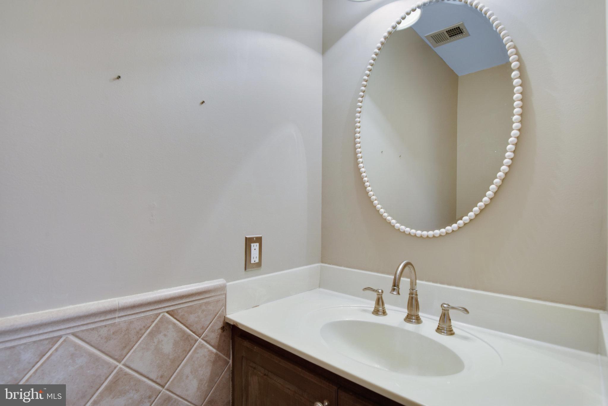 8308 Sinclair Mill Road Manassas, VA 20112 - Photo 23 of 51 Main Level Powder Room