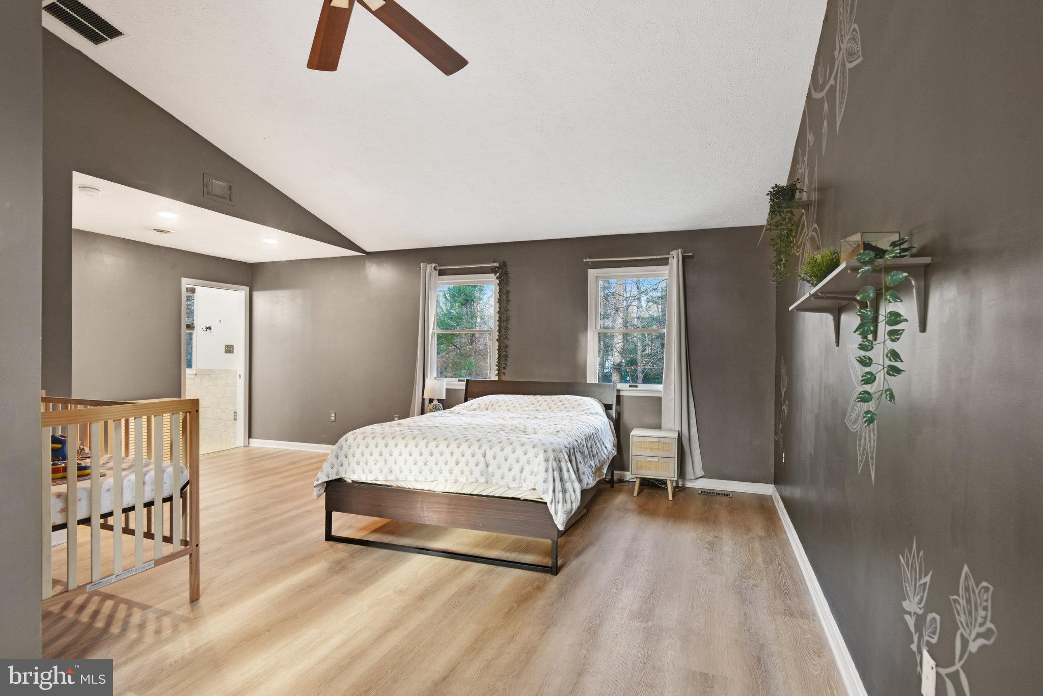 8308 Sinclair Mill Road Manassas, VA 20112 - Photo 25 of 51 Primary Bedroom with Vaulted Ceilings