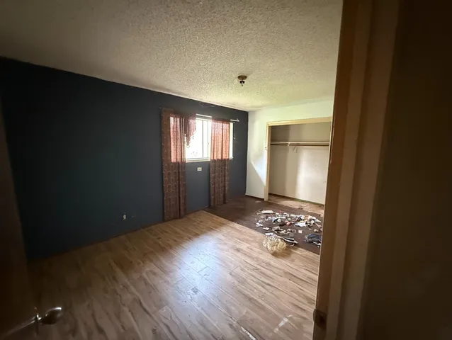 a view of entryway with kitchen