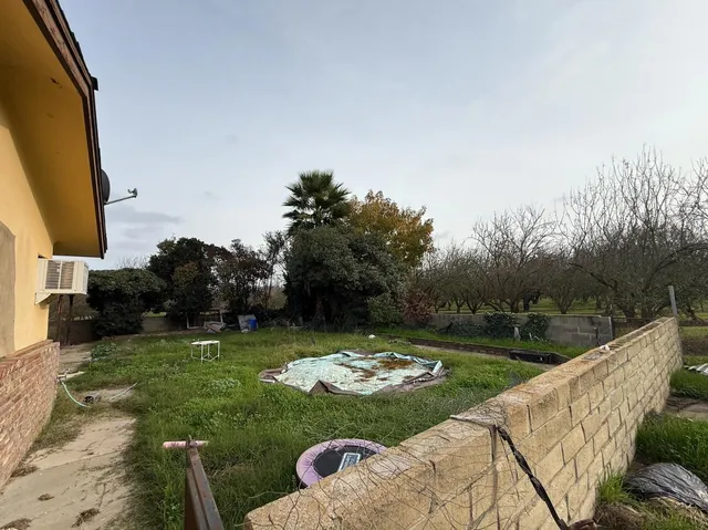 a view of a garden with a slide