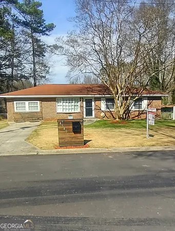 a view of a house with a swimming pool