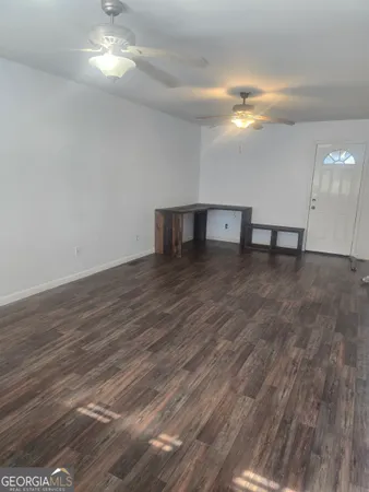 a kitchen with stainless steel appliances granite countertop a sink and a stove