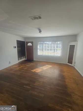 a view of an empty room with window