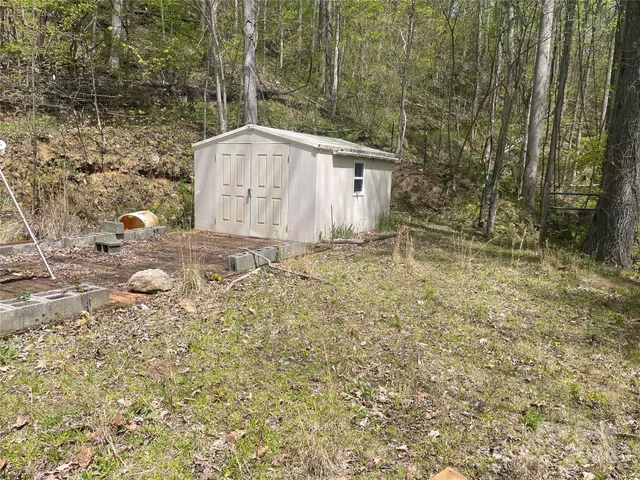 a view of outdoor space and yard