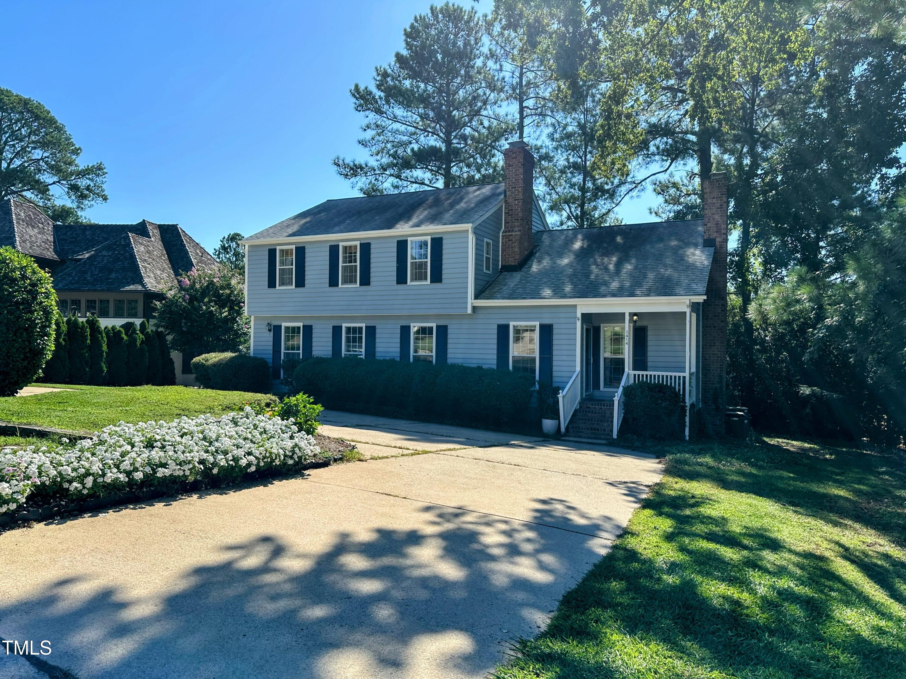 3414 Bellevue Road Raleigh, NC 27609 - Photo 1 of 20 a front view of a house with a yard