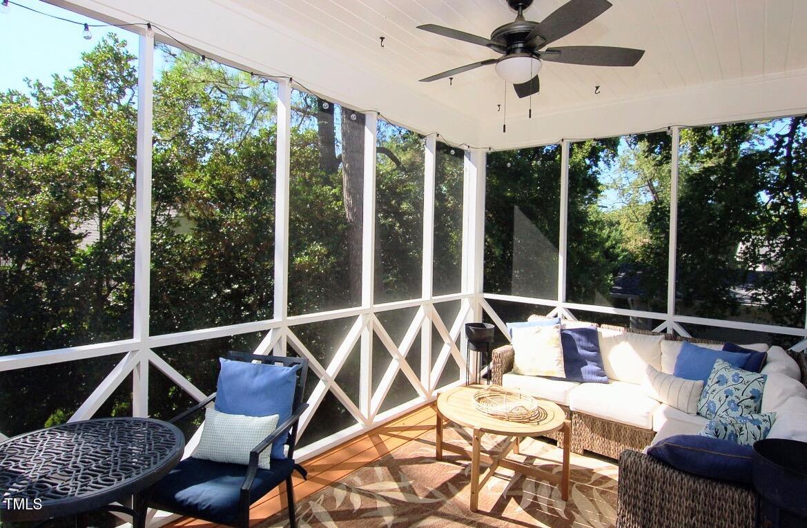 3414 Bellevue Road Raleigh, NC 27609 - Photo 15 of 20 a view of a patio with couches chairs and potted plants