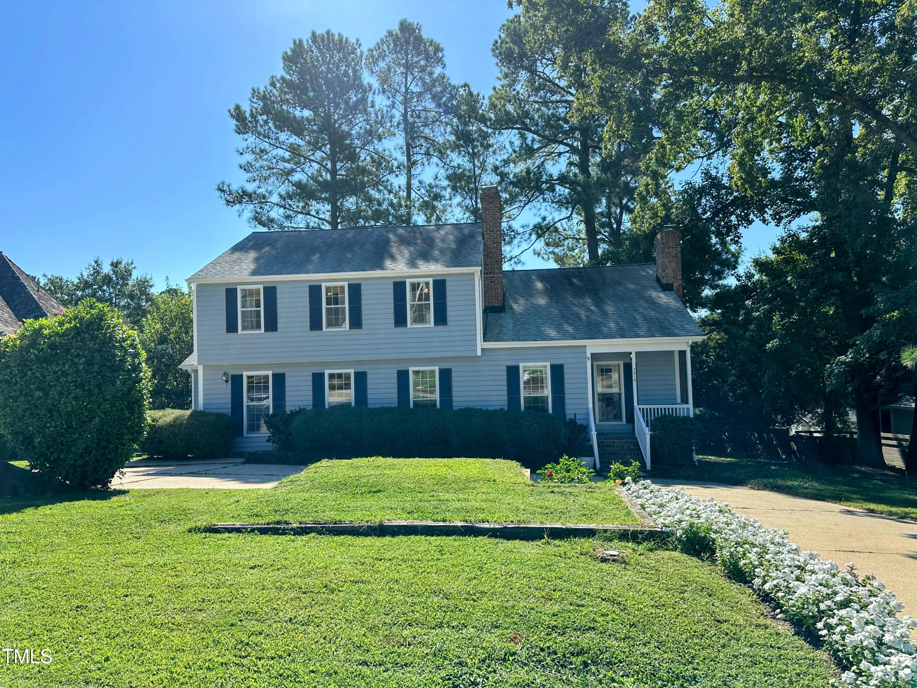 3414 Bellevue Road Raleigh, NC 27609 - Photo 16 of 20 a front view of a house with a yard