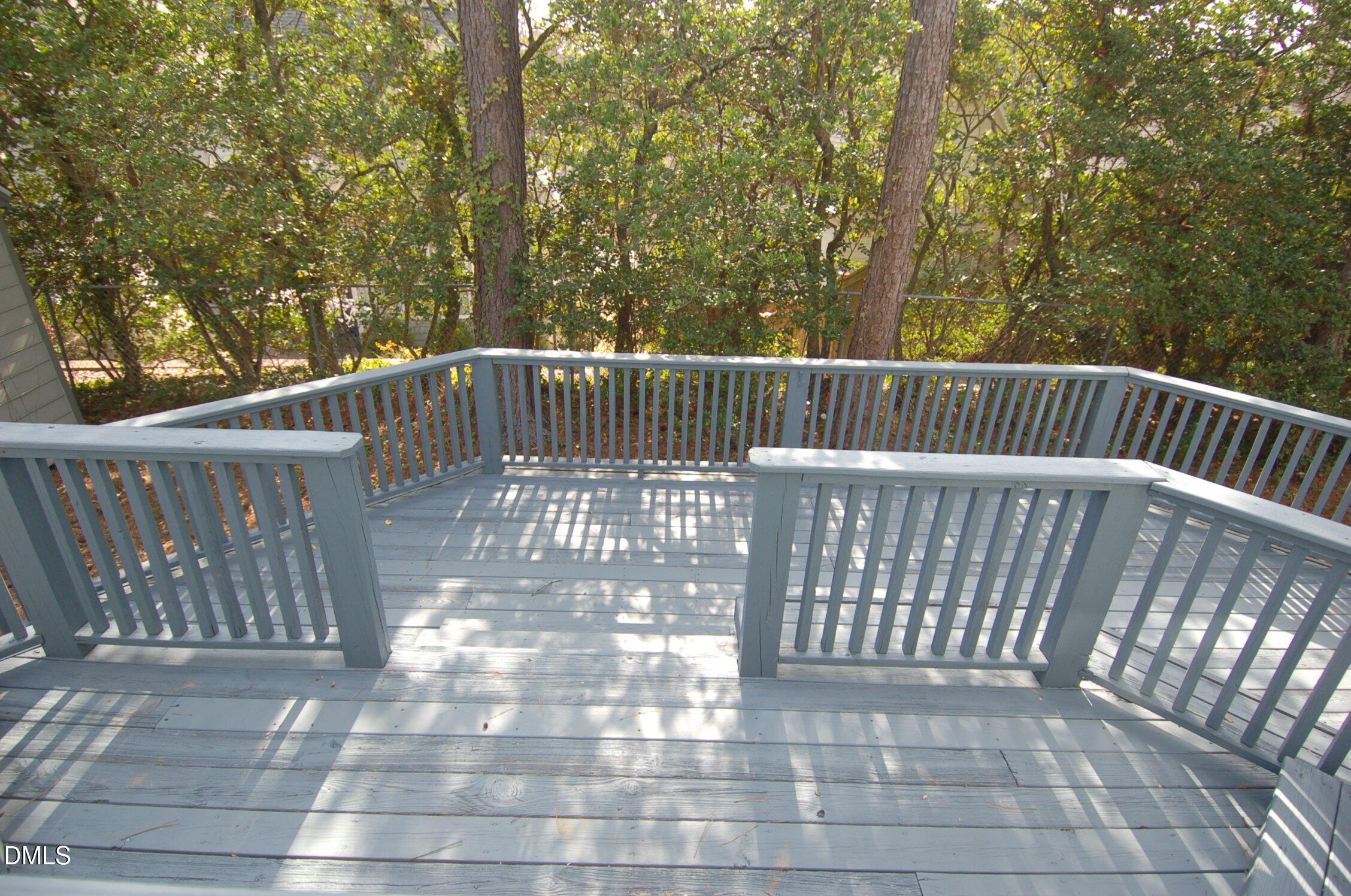 3414 Bellevue Road Raleigh, NC 27609 - Photo 18 of 20 a view of balcony with wooden floor