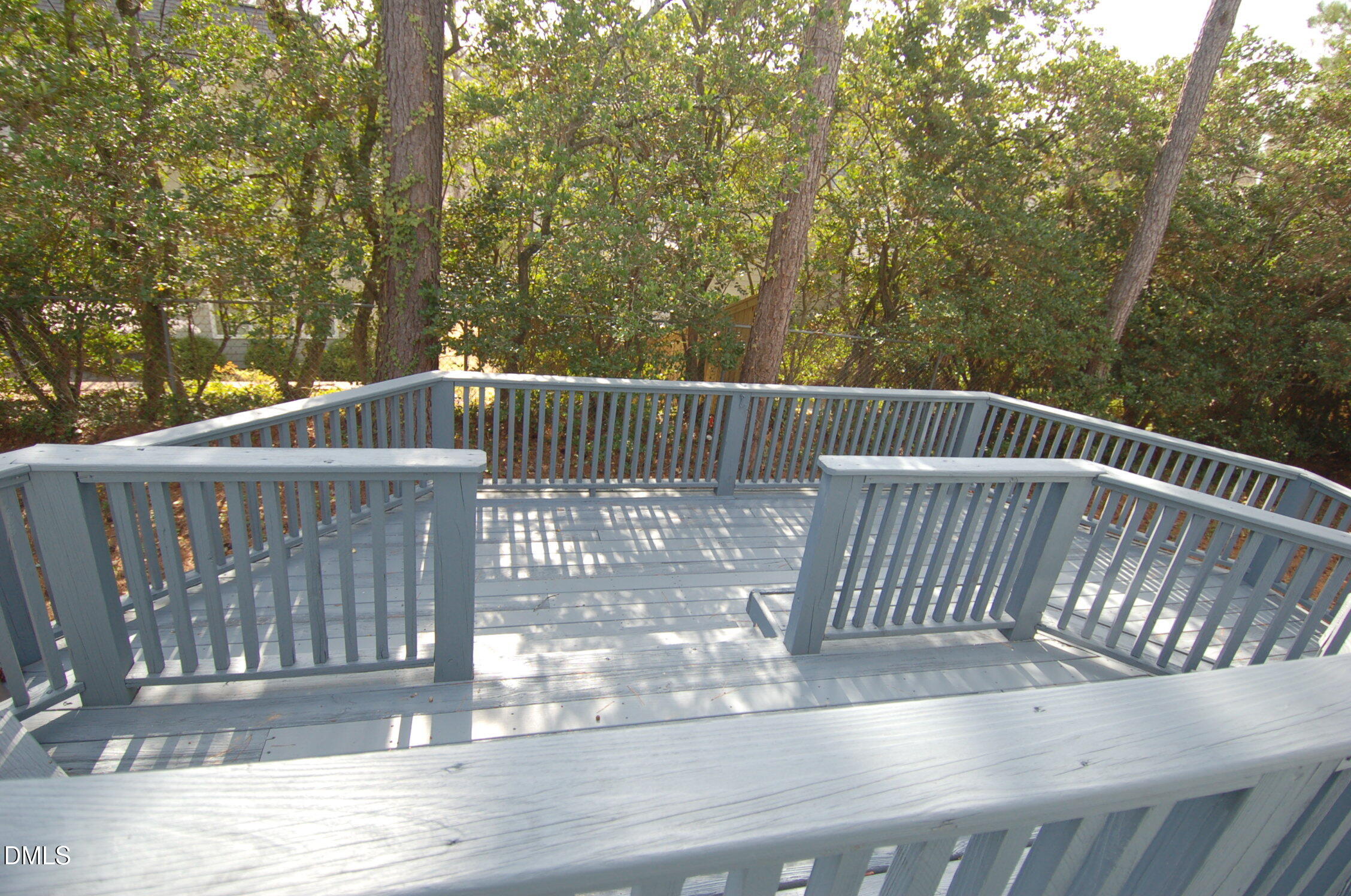 3414 Bellevue Road Raleigh, NC 27609 - Photo 20 of 20 a view of balcony with wooden floor and outdoor seating