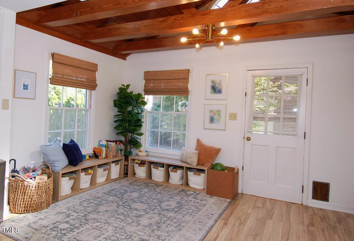 3414 Bellevue Road Raleigh, NC 27609 - Photo 5 of 20 a living room with furniture and a window