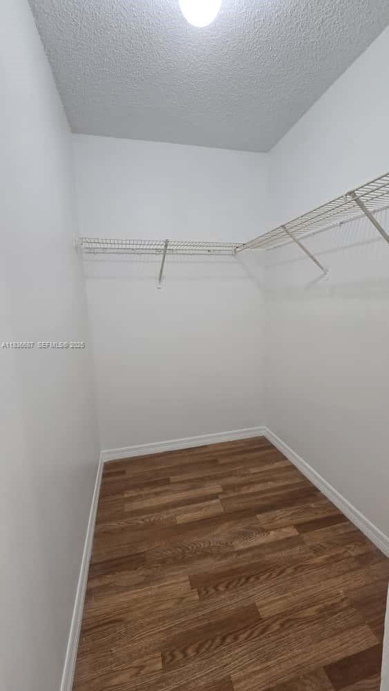 301 Palm Way, Unit 205 Pembroke Pines, FL 33025 - Photo 15 of 23 a view of a room with empty racks
