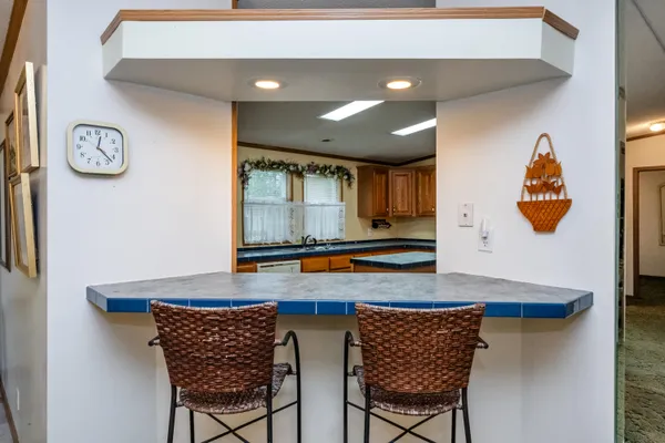 $89,900 | 8000 Warren Woods Road, Unit 62, Three Oaks, MI 49128