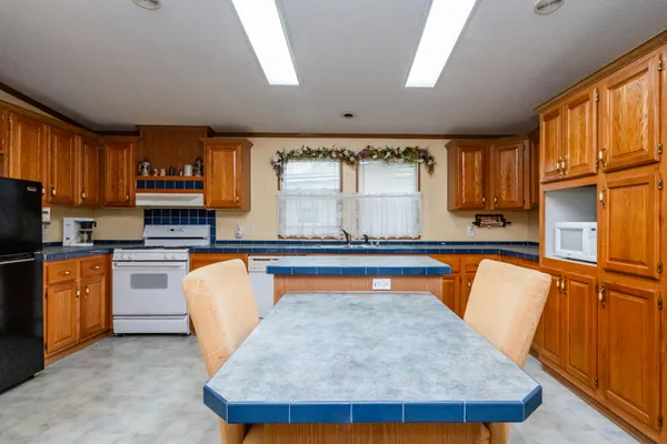 $89,900 | 8000 Warren Woods Road, Unit 62, Three Oaks, MI 49128