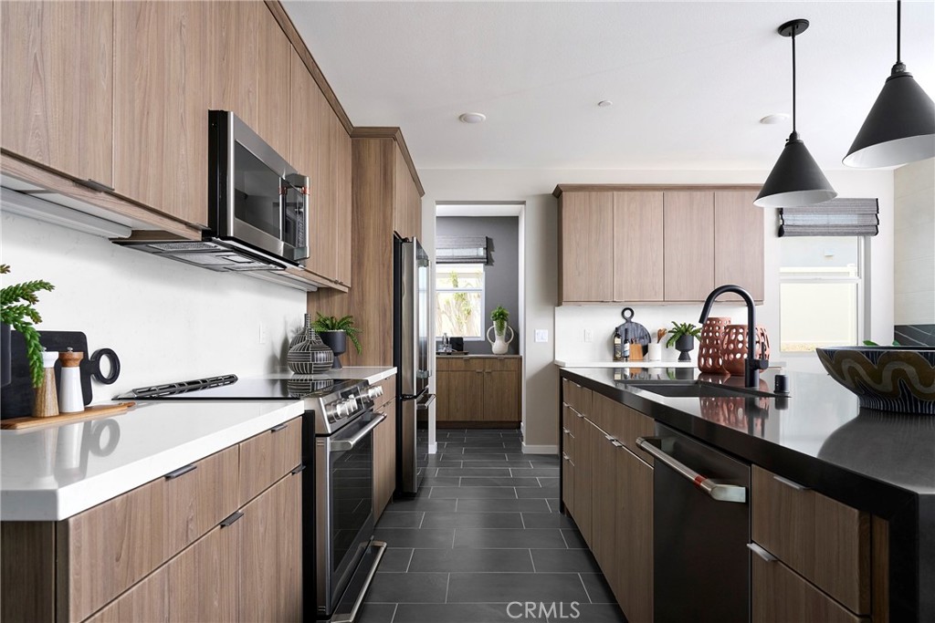 Model Photos: Photos shown are of the model home for this floor plan. Actual finishes, features, and landscaping may vary.