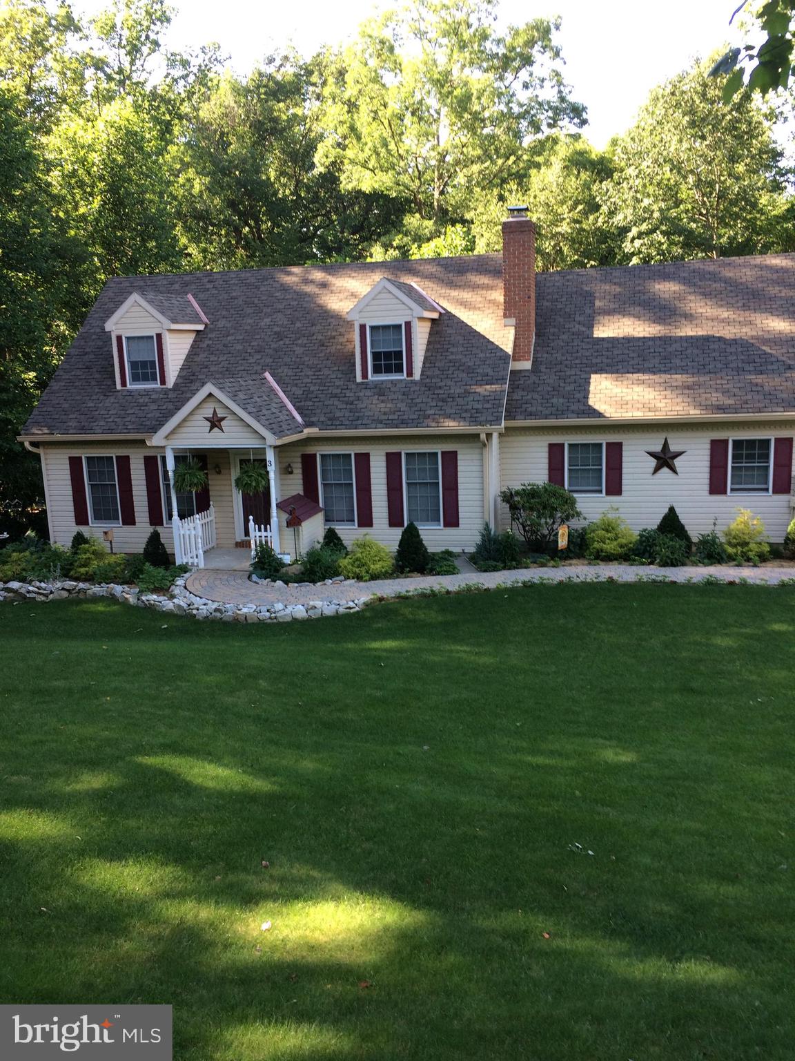 3 White Oak Road Fleetwood, PA 19522 - Photo 2 of 48 a front view of a house with a garden and trees