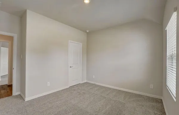 an empty room with a window