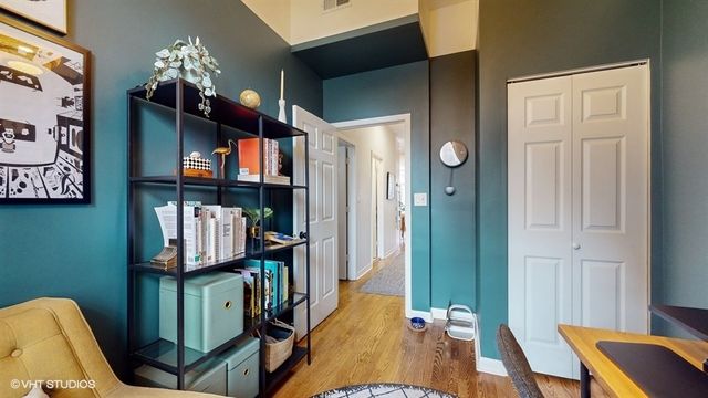 a view of a livingroom with furniture and entryway