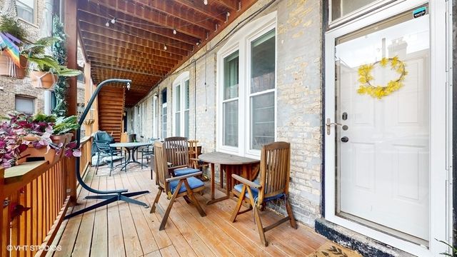 a view of an outdoor space with furniture