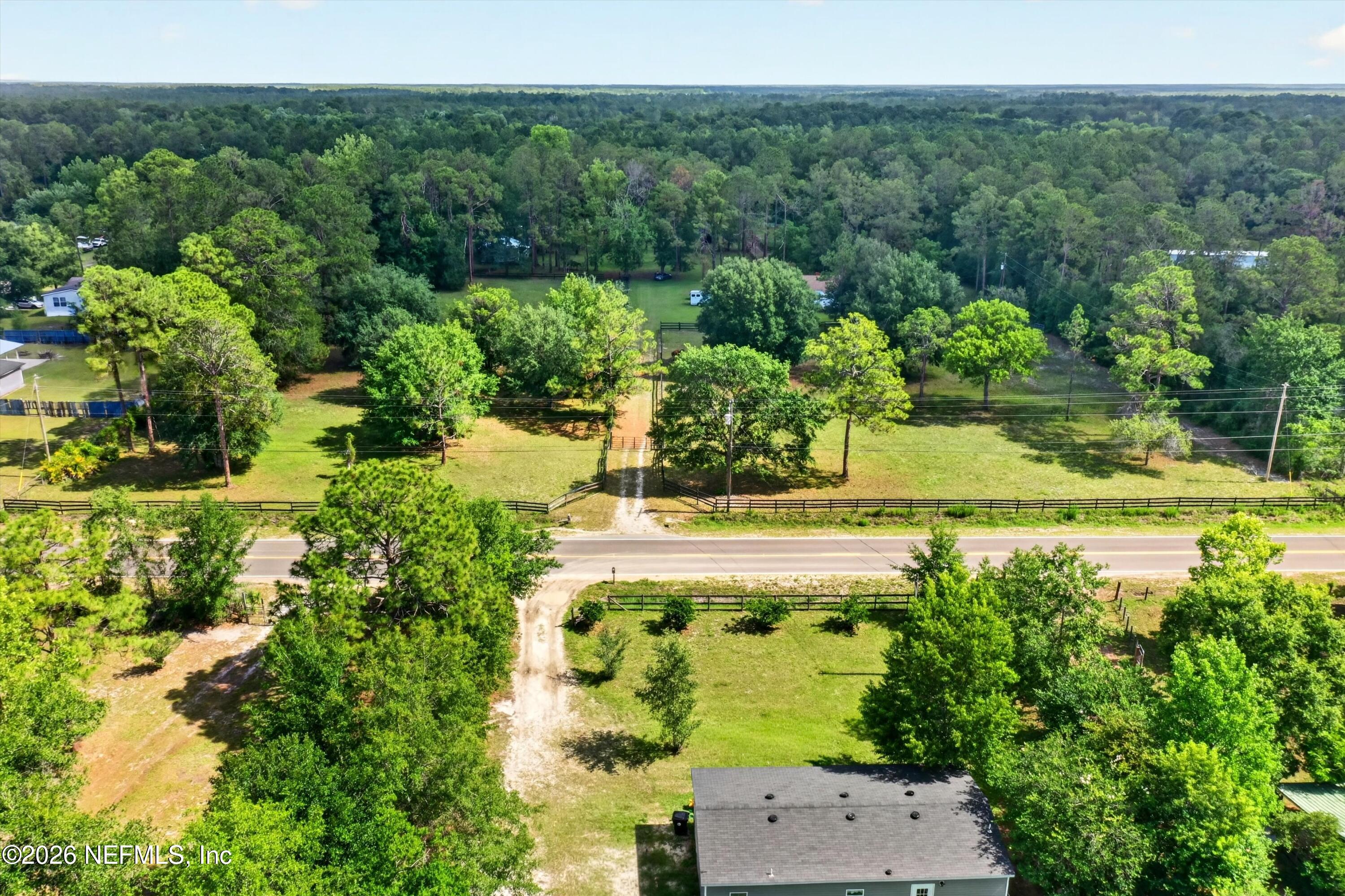 5214 Carter Spencer Road Middleburg, FL 32068 - Photo 46 of 50 an aerial view of a house with a yard