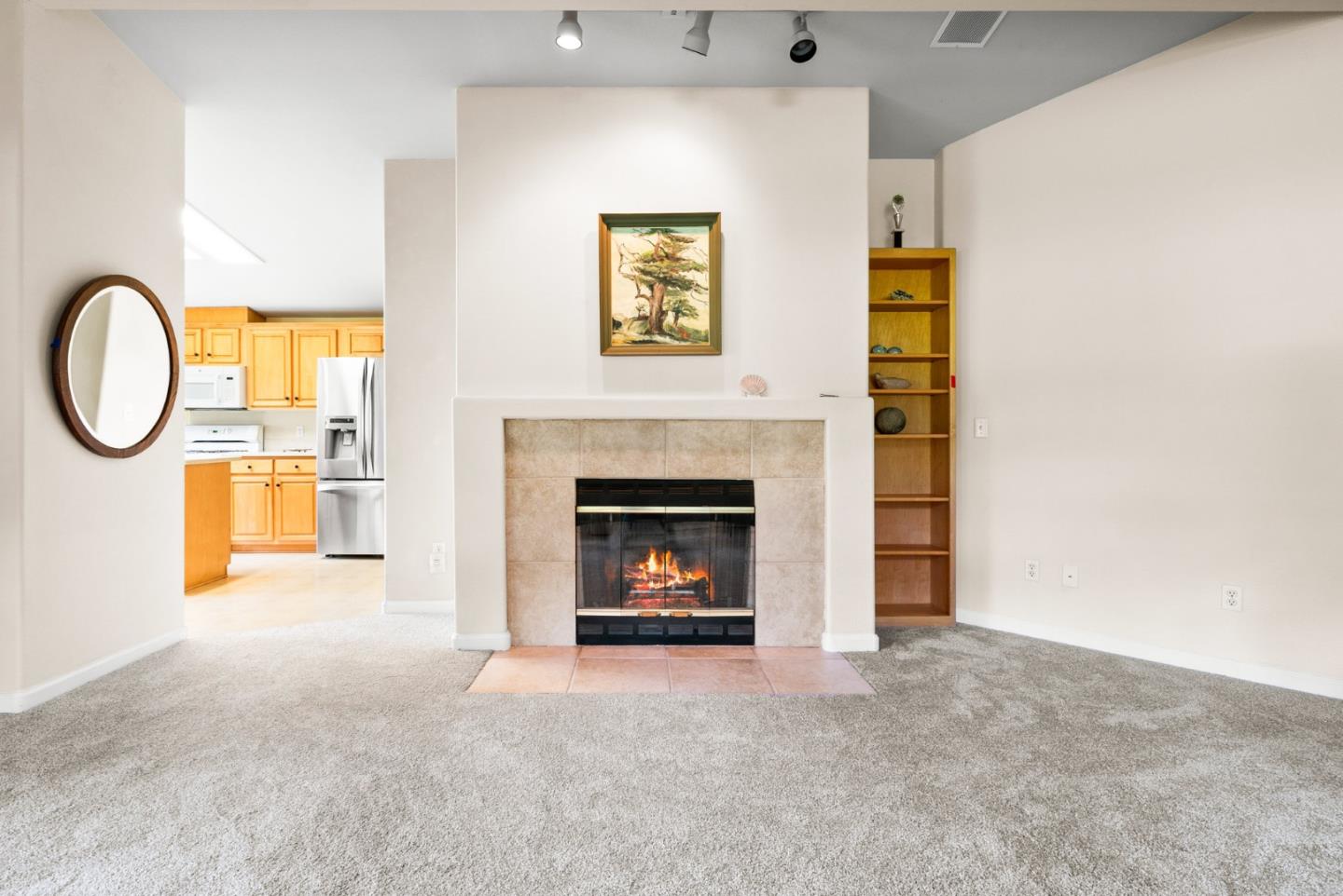 225 Mt Hermon Road, Unit 199 Scotts Valley, CA 95066 - Photo 11 of 44 a view of a livingroom with a fireplace and a window