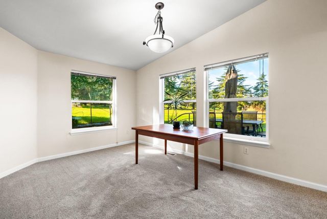 a view of a room with furniture window and outside view