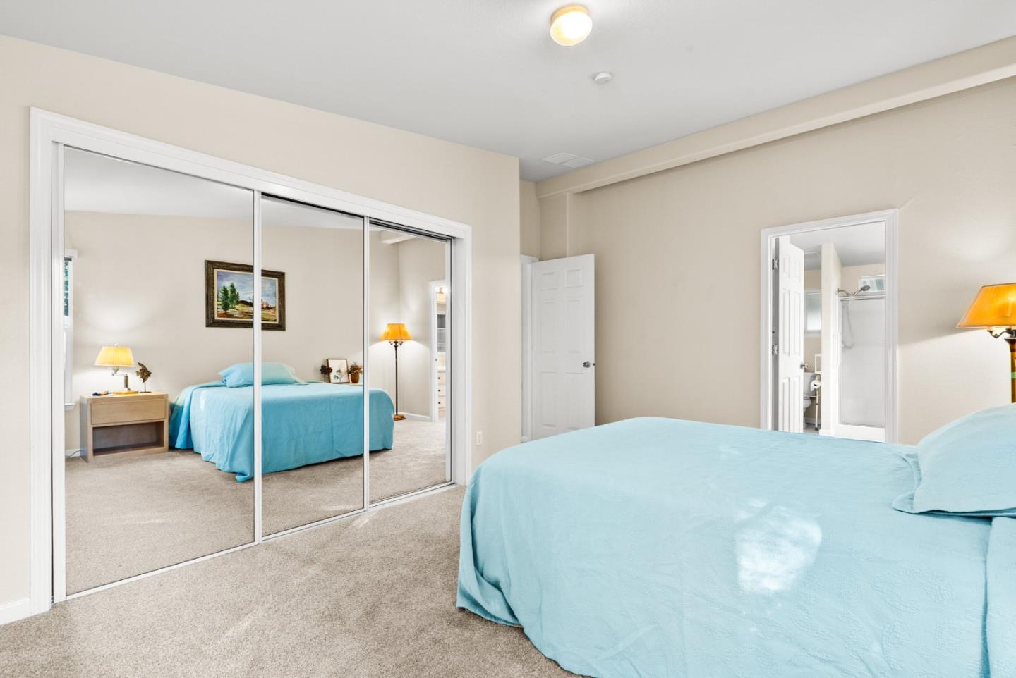 225 Mt Hermon Road, Unit 199 Scotts Valley, CA 95066 - Photo 31 of 44 a bedroom with a bed and dresser