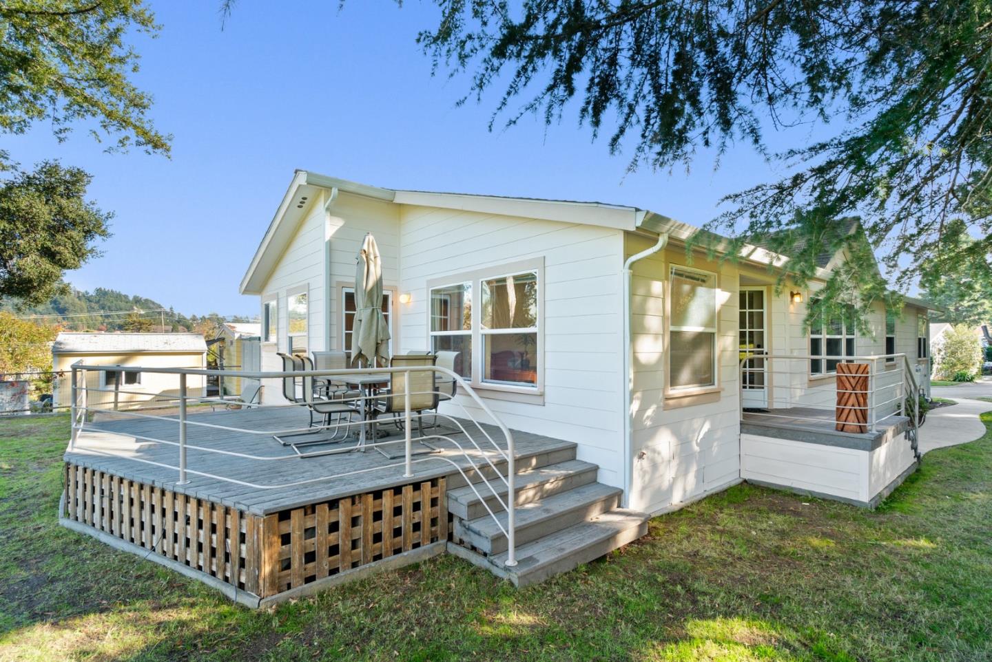 225 Mt Hermon Road, Unit 199 Scotts Valley, CA 95066 - Photo 38 of 44 a view of a patio with couches table and chairs and potted plants