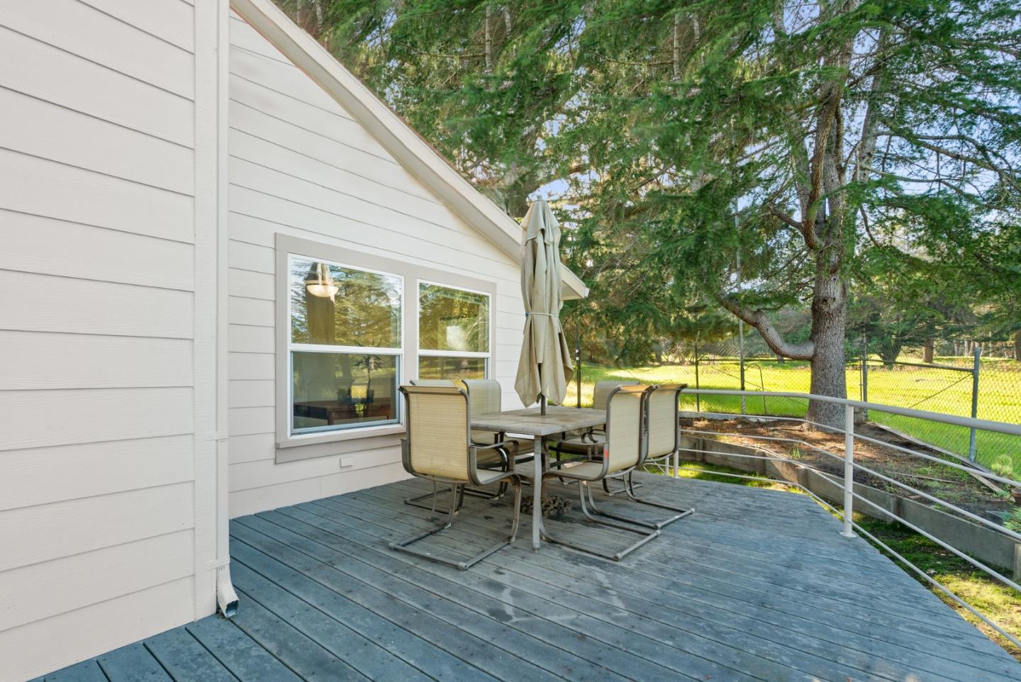 225 Mt Hermon Road, Unit 199 Scotts Valley, CA 95066 - Photo 43 of 44 a roof deck with table and chairs and wooden floor