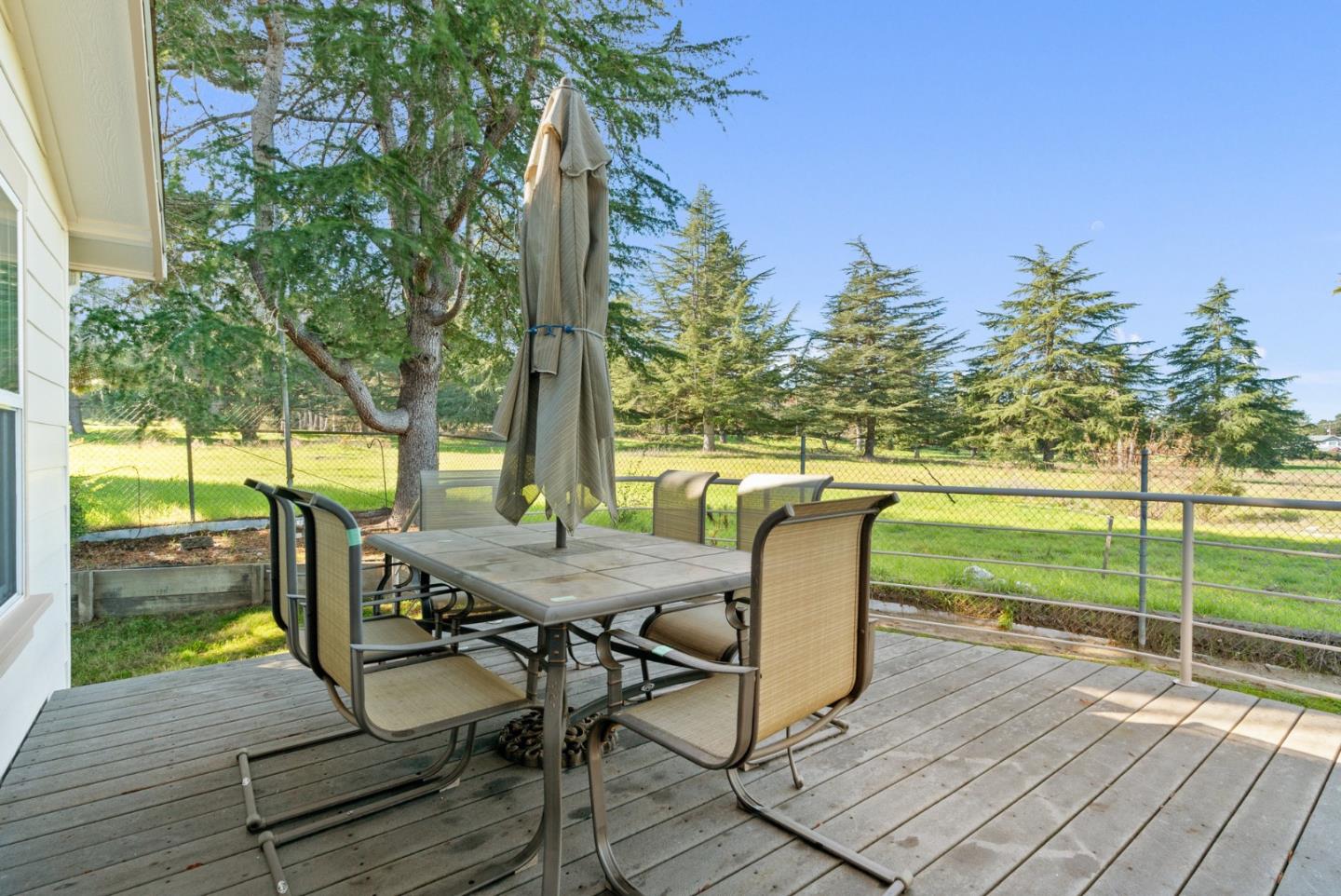 225 Mt Hermon Road, Unit 199 Scotts Valley, CA 95066 - Photo 44 of 44 a view of a chairs and table in patio with a swimming pool