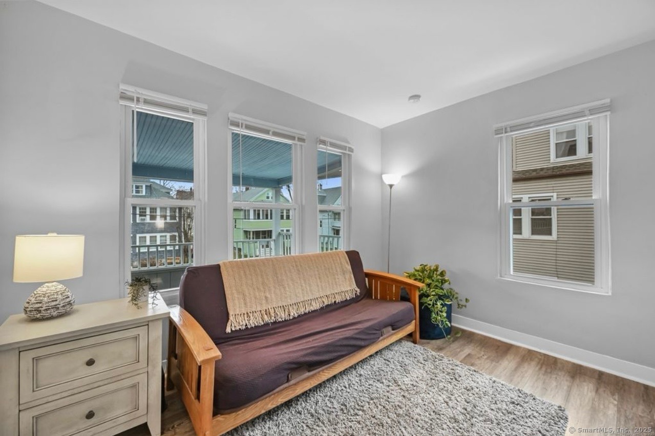 115 Harborview Avenue, Unit 1 Bridgeport, CT 06605 - Photo 2 of 11 a living room with furniture and a window
