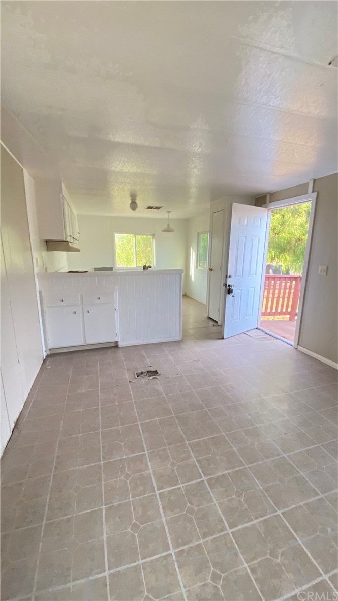 20455 Hunter Street Perris, CA 92570 - Photo 21 of 35 a view of a kitchen with furniture and a window