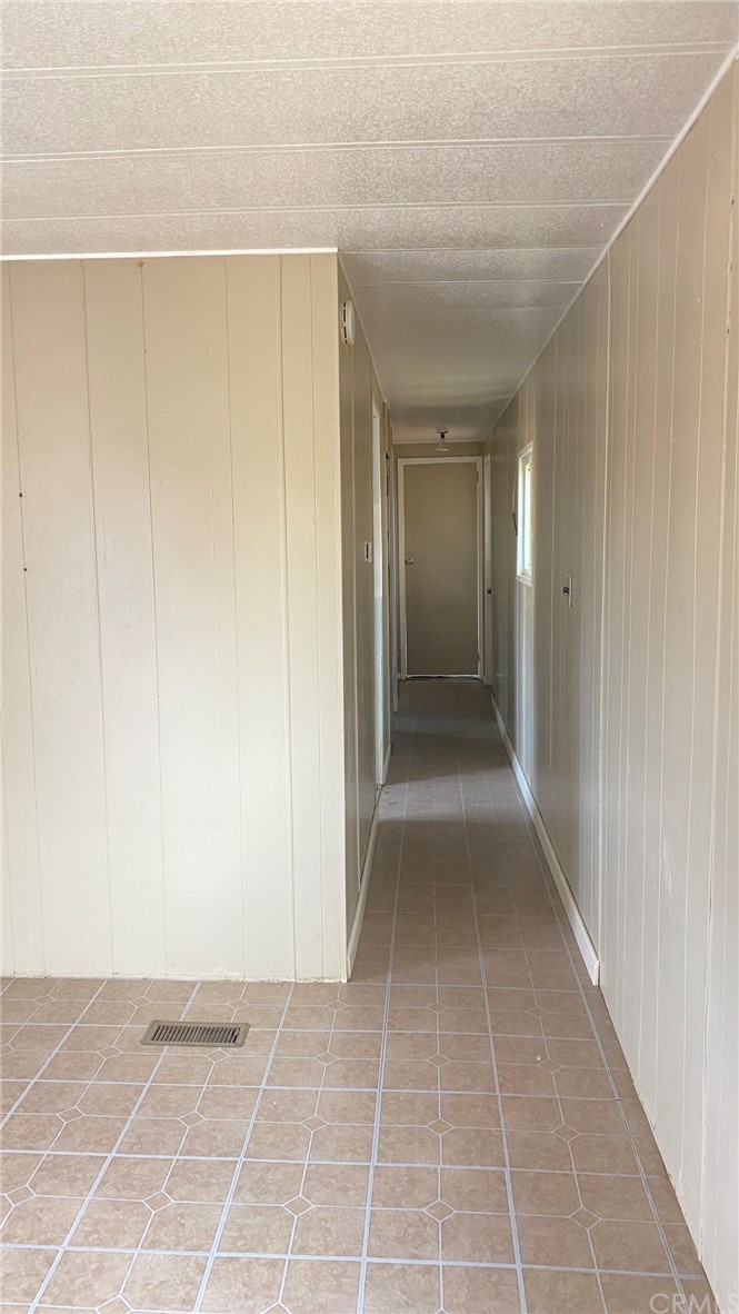 20455 Hunter Street Perris, CA 92570 - Photo 3 of 35 a view of hallway with a large window and a shower