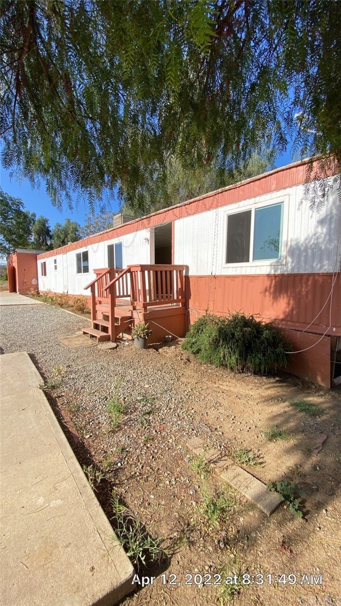20455 Hunter Street Perris, CA 92570 - Photo 35 of 35 a view of a house with a yard