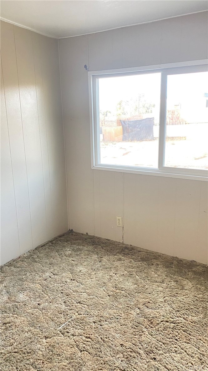 20455 Hunter Street Perris, CA 92570 - Photo 8 of 35 a view of an empty room with a window
