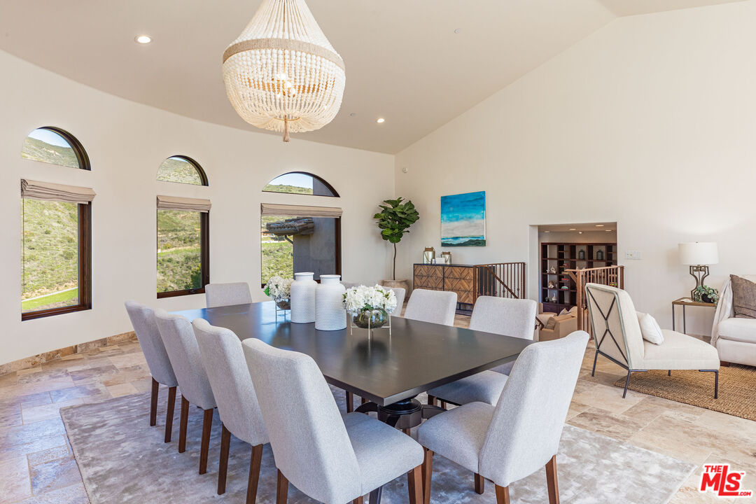 4800 Latigo Canyon Road Malibu, CA 90265 - Photo 22 of 56 a view of a dining room with furniture