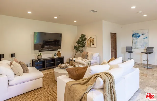 a view of a swimming pool with a yard