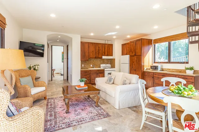 a bedroom with a bed and a lamp