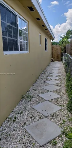a view of a backyard of a house