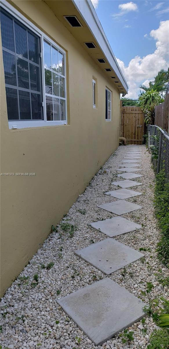 9285 Southwest 37th Street Miami, FL 33165 - Photo 13 of 17 a view of a backyard of a house