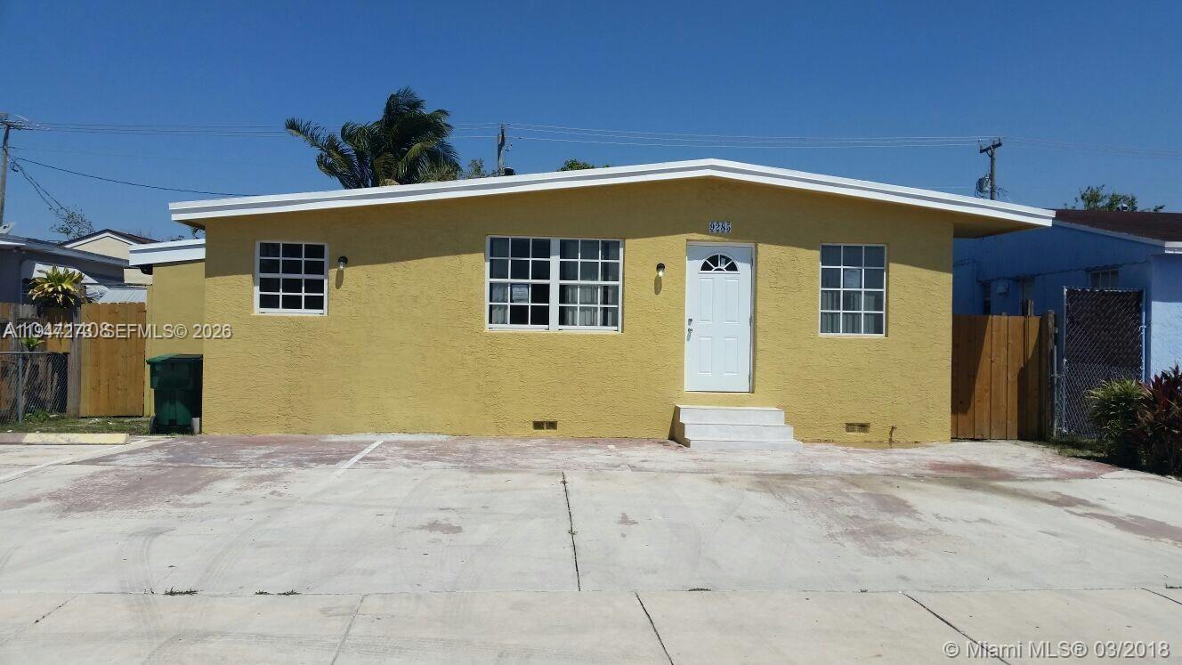 9285 Southwest 37th Street Miami, FL 33165 - Photo 17 of 17 a front view of a house