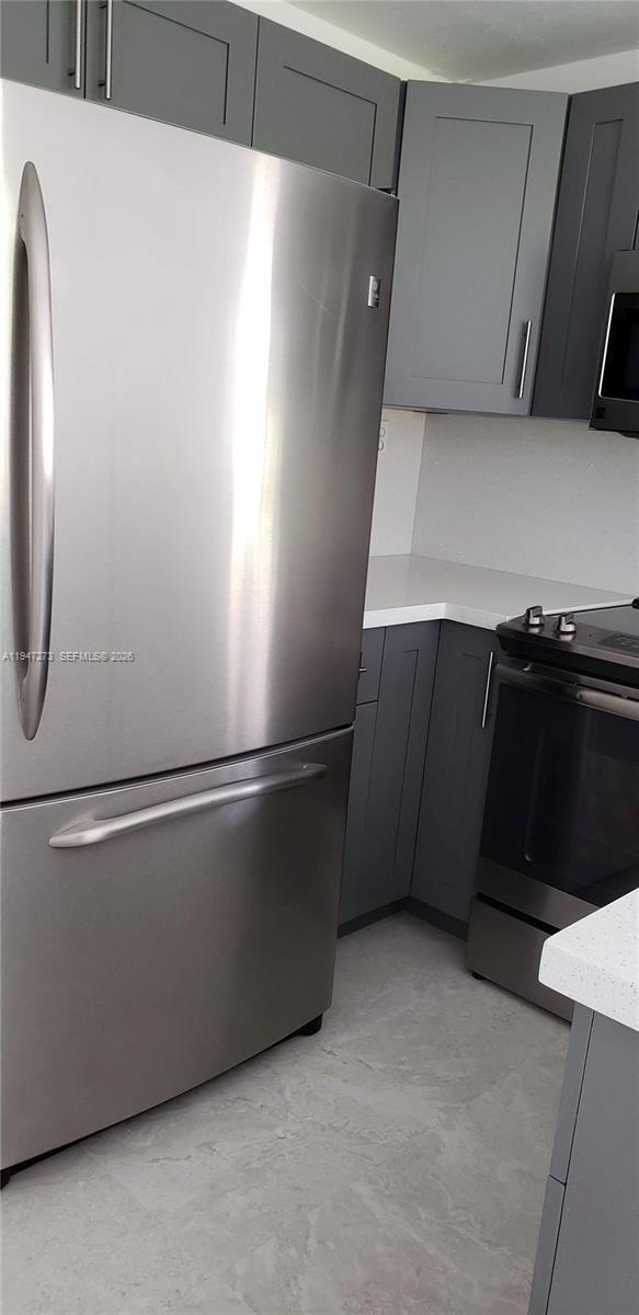 9285 Southwest 37th Street Miami, FL 33165 - Photo 4 of 17 a view of an empty room